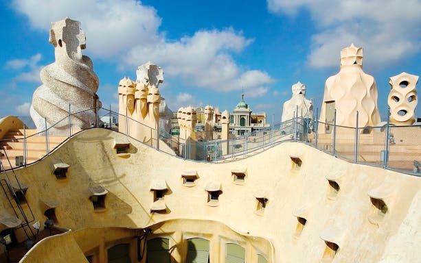 Casa Milà rooftop chimneys in Barcelona, part of skip-the-line tour combo with Sant Pau Modernista.