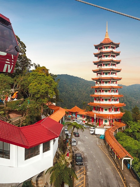 Genting Awana SkyWay gondola with Chin Swee Caves Temple in the background, Malaysia.