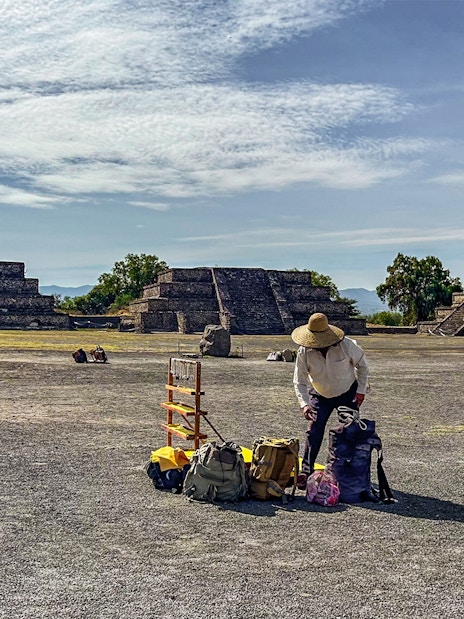 Vendor setting up near ruins along Avenue of the Dead, Teotihuacan.
