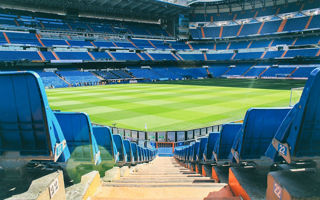 View of Santiago Bernabeu Stadium field from the stands.