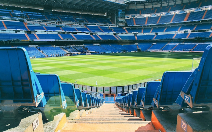 View of Santiago Bernabeu Stadium field from the stands.