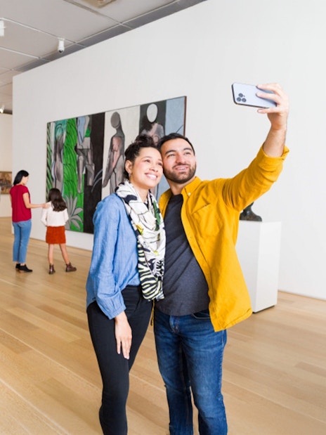 Couple taking a selfie in a gallery at The Art Institute of Chicago.