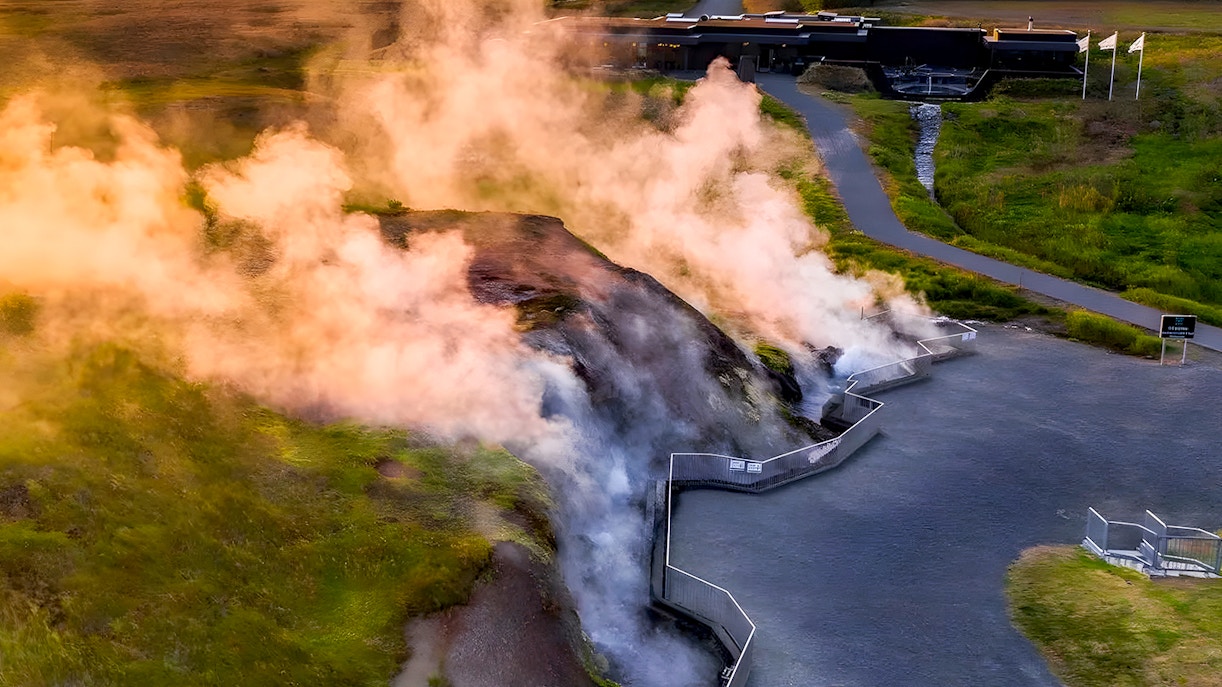Krauma Geothermal Baths with steam rising from hot springs in Iceland.