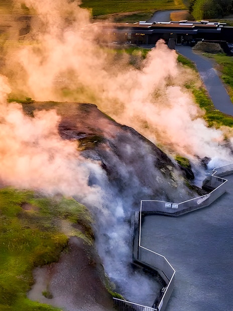 Krauma Geothermal Baths with steam rising from hot springs in Iceland.