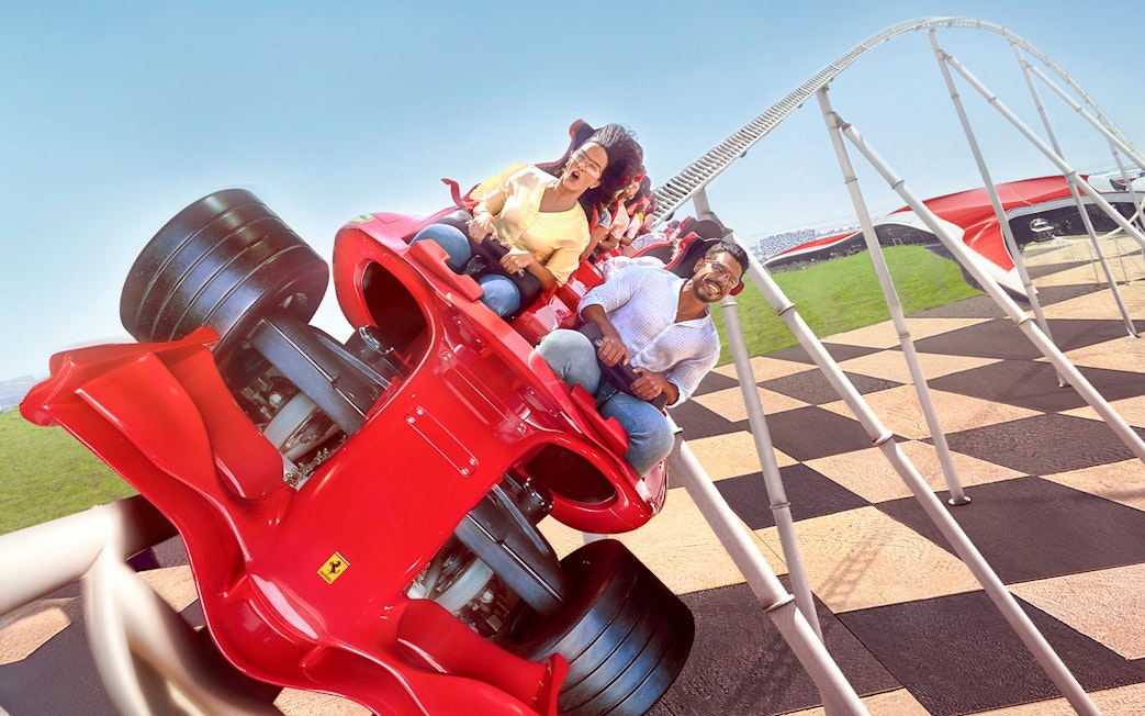 Riders on Formula Rossa roller coaster at Ferrari World, Abu Dhabi.