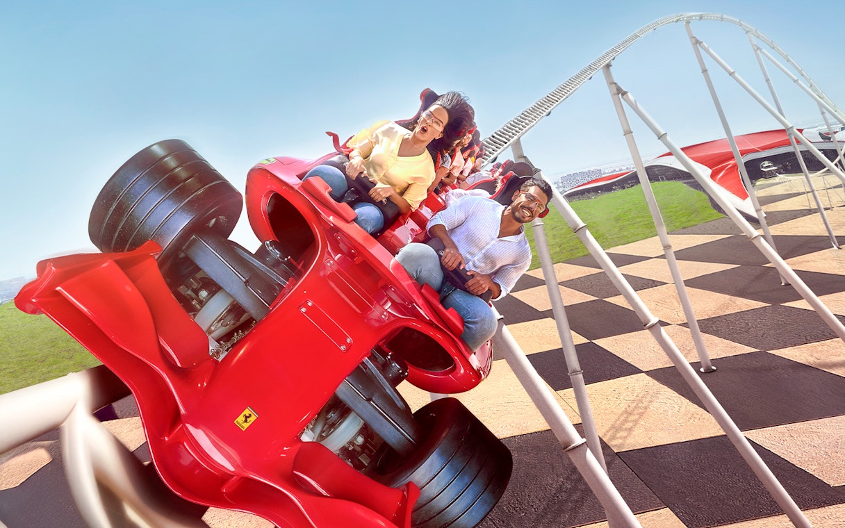 Riders on Formula Rossa roller coaster at Ferrari World, Abu Dhabi.