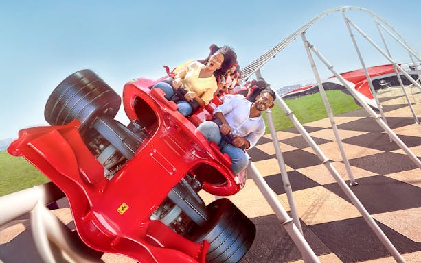 Riders on Formula Rossa roller coaster at Ferrari World, Abu Dhabi.