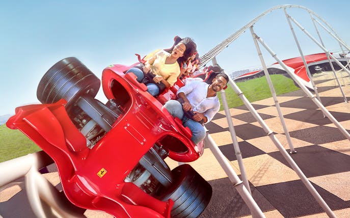 Riders on Formula Rossa roller coaster at Ferrari World, Abu Dhabi.