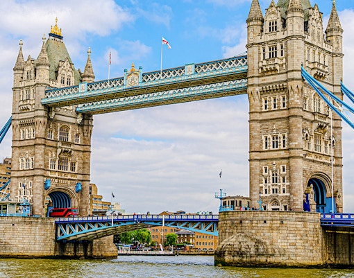 Tower Bridge spanning the River Thames in London, featuring its iconic twin towers.