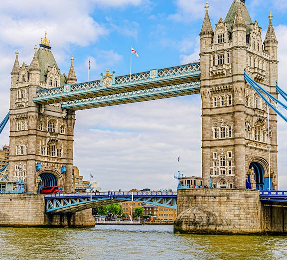 Tower Bridge spanning the River Thames in London, featuring its iconic twin towers.