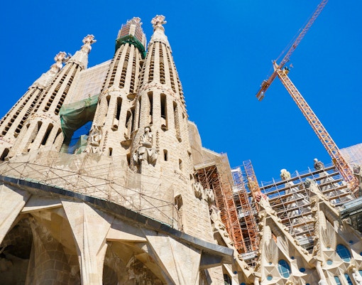 Sagrada Familia Passion façade with crane in Barcelona under construction