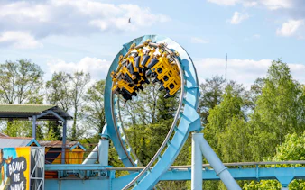 Roller coaster loop at Drayton Manor with riders upside down.