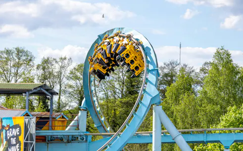 Roller coaster loop at Drayton Manor with riders upside down.