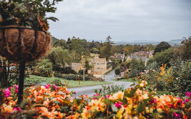 Blenheim Palace with gardens, Cotswolds village day trip from London.