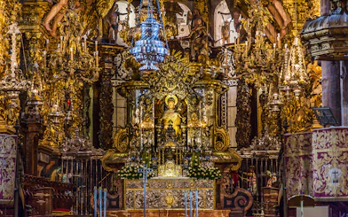 Statue of Saint James on ornate altar in Santiago de Compostela Cathedral.
