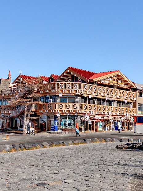 Fifth Station on Mount Fuji with shops and a bus in Japan.