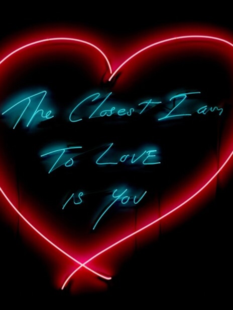 Neon heart artwork with text "The Closest I Am To Love Is You" at Moco Museum London.