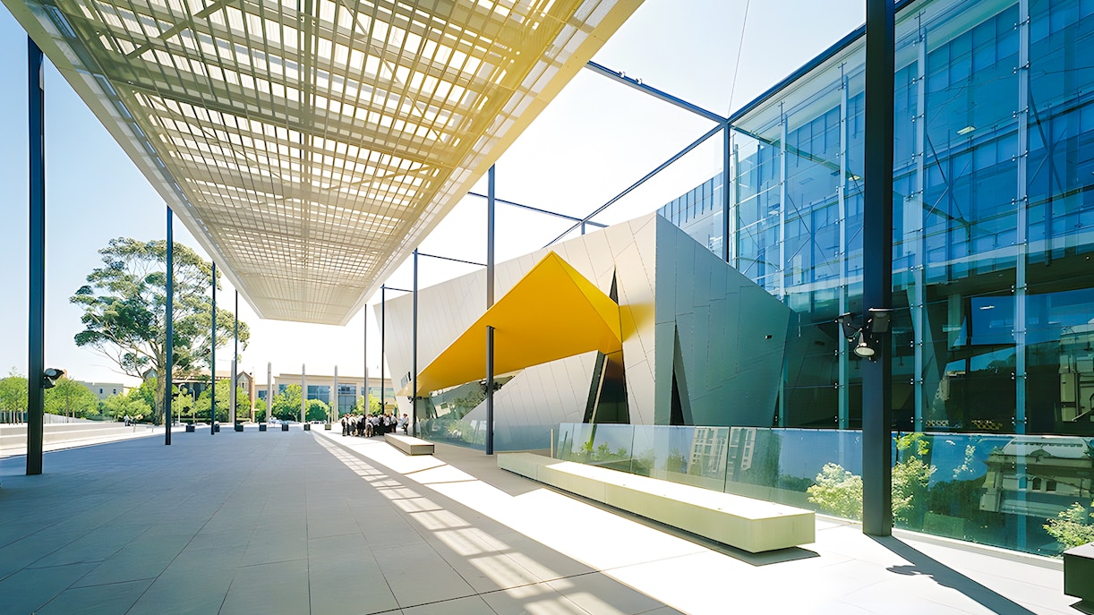 Melbourne Museum entrance with modern architecture and glass facade.