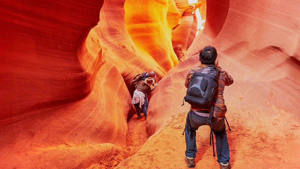 Exploring the narrow passageways of Lower Antelope Canyon, Arizona.