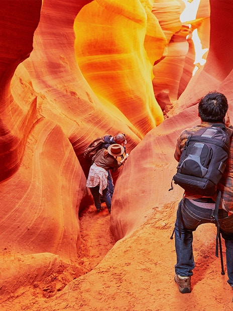 Exploring the narrow passageways of Lower Antelope Canyon, Arizona.