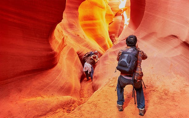 Exploring the narrow passageways of Lower Antelope Canyon, Arizona.