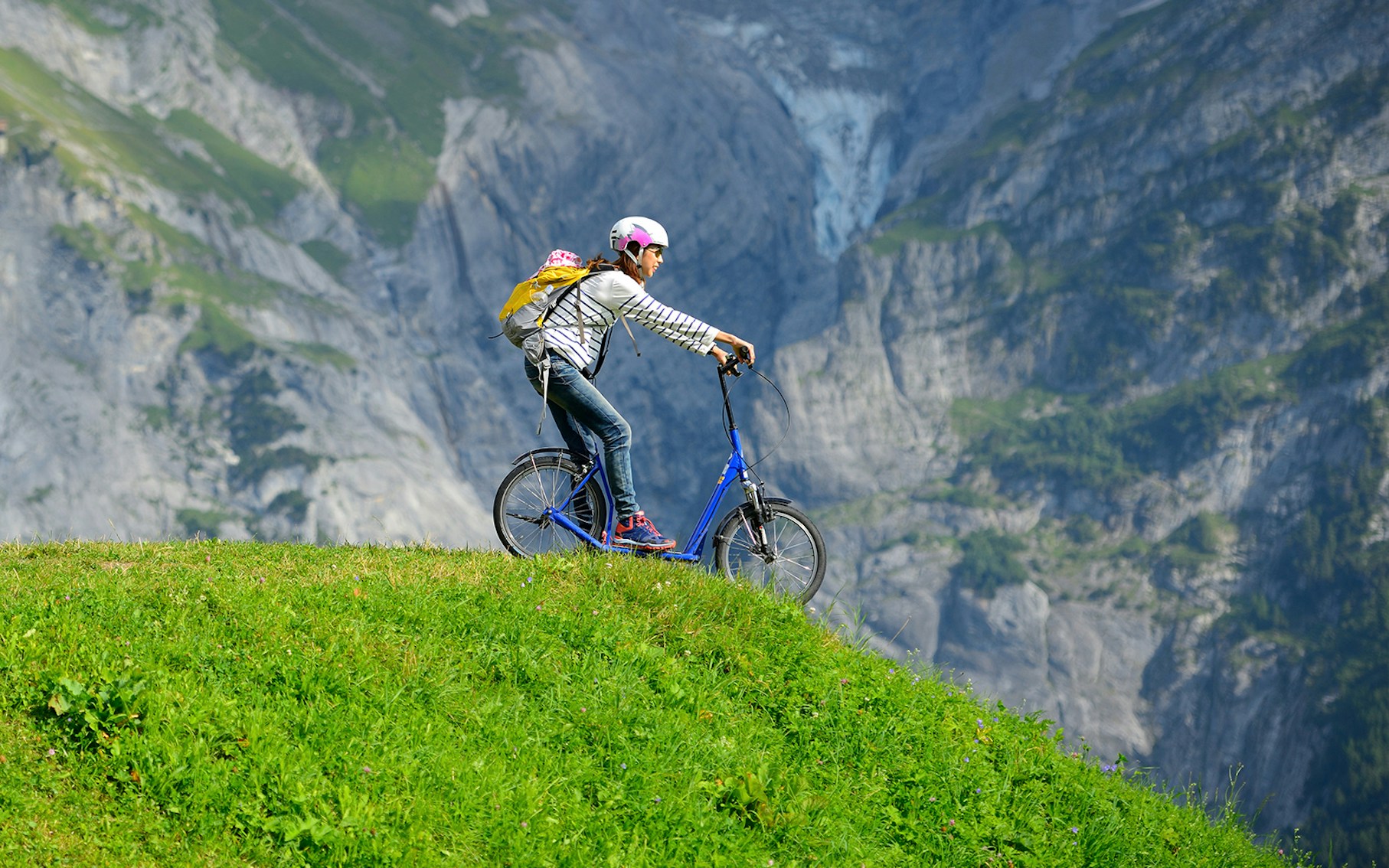 Jungfraujoch Grindelwald First Trottibike scooter ride in Swiss Alps.