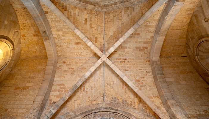 Ceiling of Castel del Monte in Andria, featuring intricate geometric patterns and historical architecture.