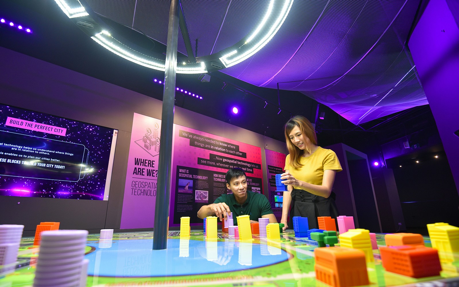 Visitors exploring the interactive exhibits at the Science museum