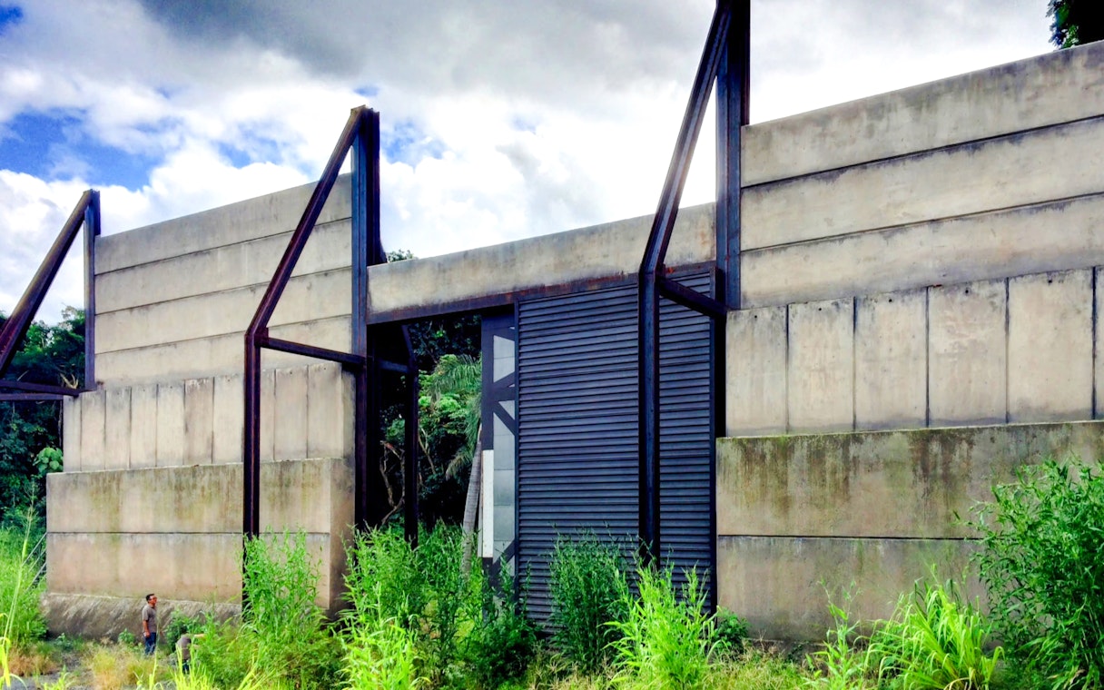 Concrete gate structure at Kualoa Ranch, Hawaii, part of the Jurassic Adventure Tour.