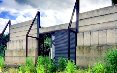 Concrete gate structure at Kualoa Ranch, Hawaii, part of the Jurassic Adventure Tour.