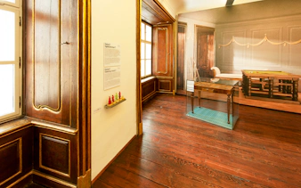 Mozarthaus interior with historical gaming room display, Vienna.