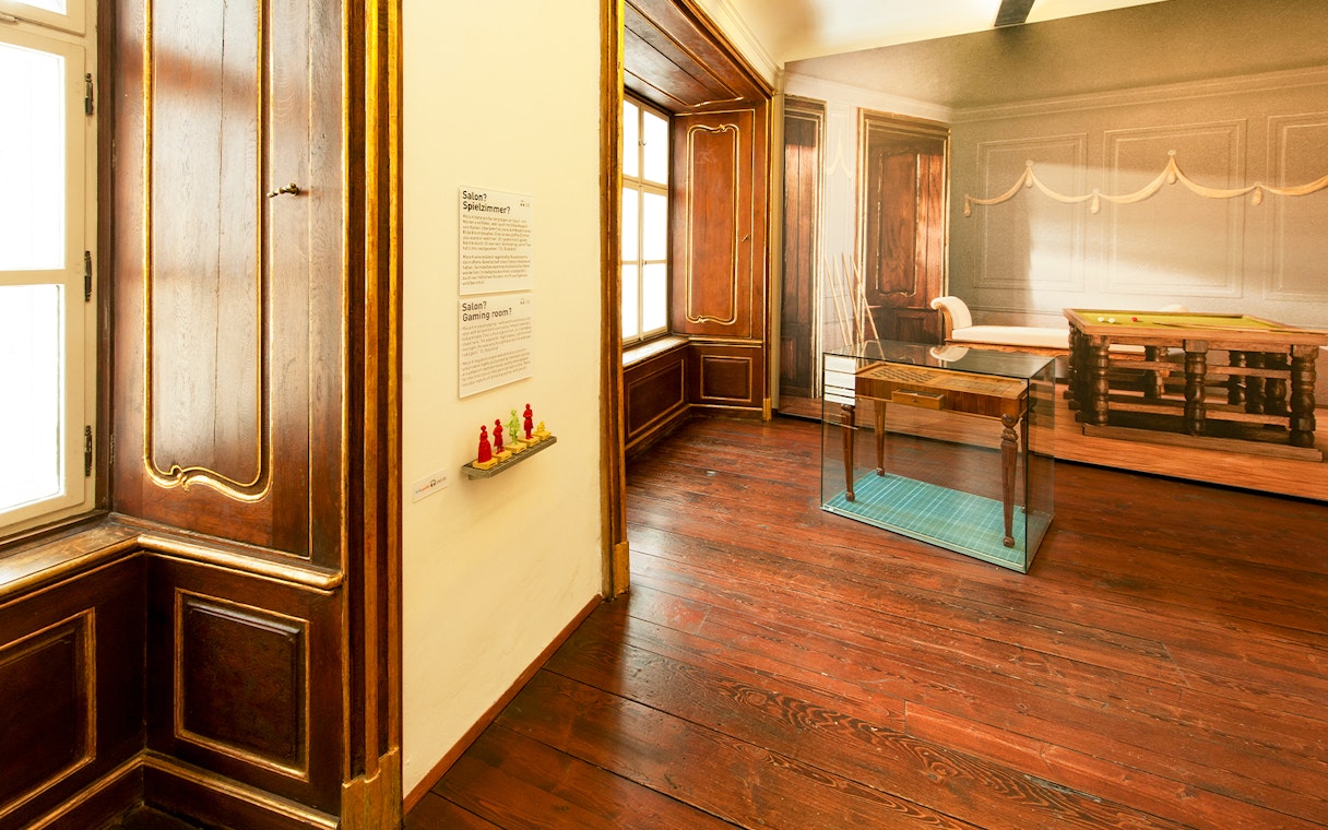 Mozarthaus interior with historical gaming room display, Vienna.