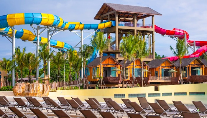 Water slides and lounge chairs at Andamanda Stage, Andamanda Phuket.