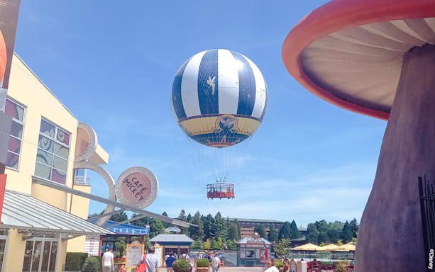Balloon PanoraMagique floating above Disneyland Paris near Café Mickey.