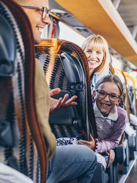 Passengers enjoying a ride on a Terravision bus from Fiumicino Airport to Rome City Center.