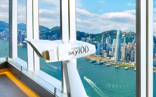 Sky100 observation deck view of Hong Kong skyline and Victoria Harbour.