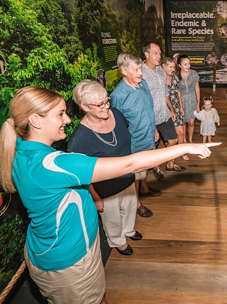 Visitors exploring exhibits at Cairns Aquarium by Twilight tour.