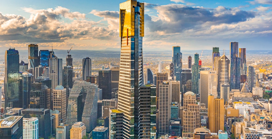 Melbourne cityscape with Eureka Tower and surrounding skyscrapers.
