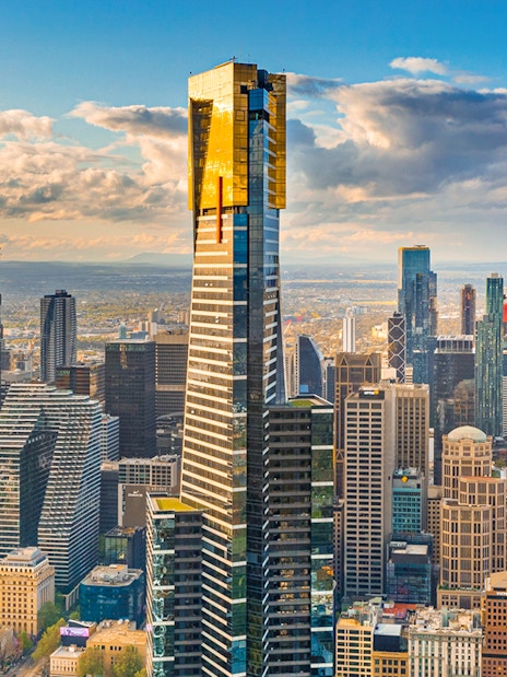 Melbourne cityscape with Eureka Tower and surrounding skyscrapers.