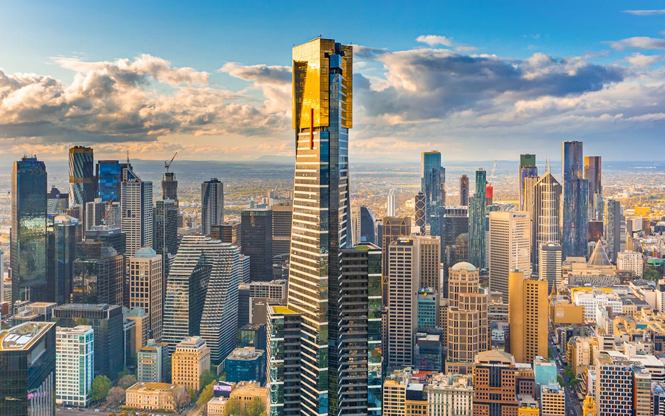 Melbourne cityscape with Eureka Tower and surrounding skyscrapers.