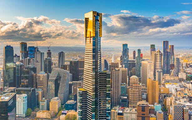 Melbourne cityscape with Eureka Tower and surrounding skyscrapers.