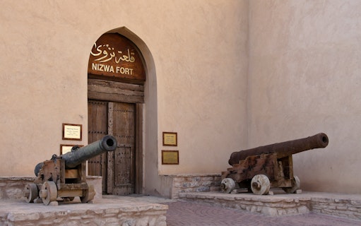 Two bronze cannons at the entrance of Nizwa Fort, Oman.