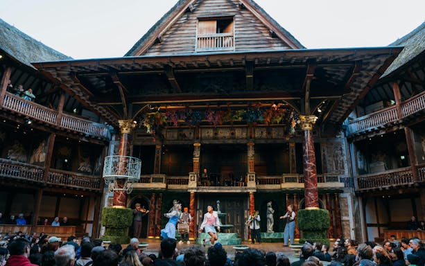 Stage performance of A Midsummer Night’s Dream at Westend theater with actors and musicians.