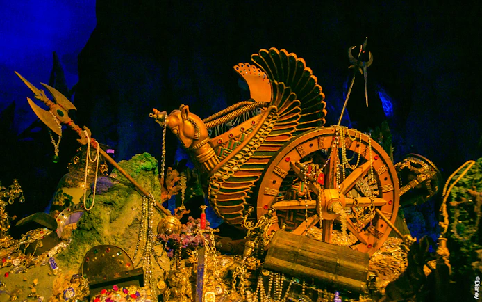 Treasure scene with ornate artifacts and jewels at Shanghai Disneyland attraction.