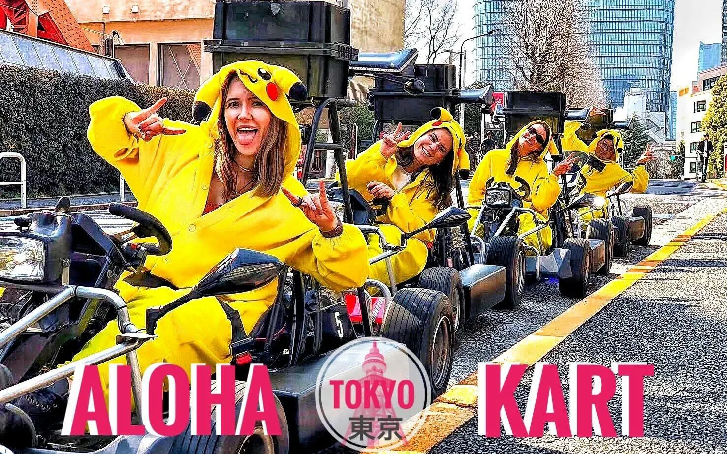 Tourists in Pikachu costumes on go-karts during a guided tour in Tokyo.