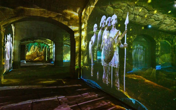 Projections of historical figures in Porto Legends tour with audioguide.
