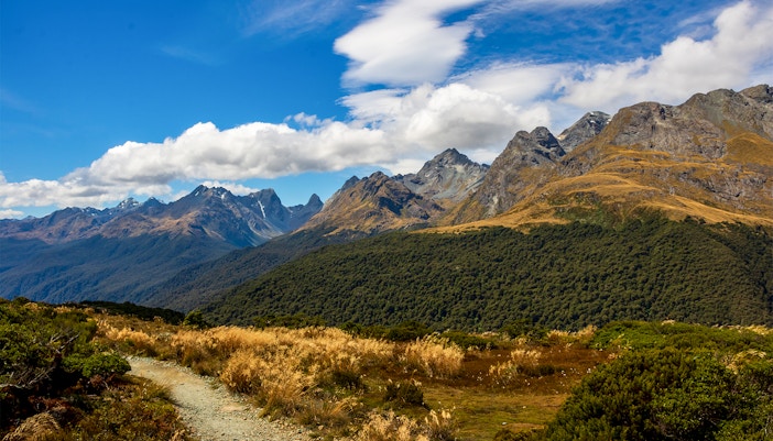 Milford Road winding through The Divide in New Zealand's Fiordland National Park.