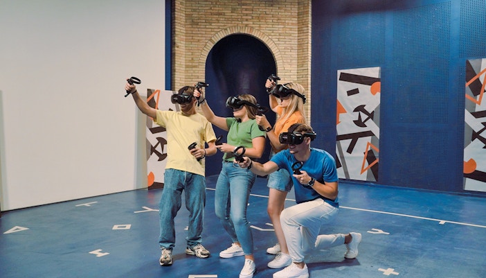 Visitors enjoying a virtual reality experience at Tibidabo Amusement Park.