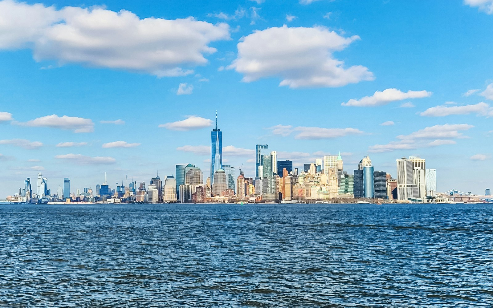 Statue of Liberty and Manhattan skyline from 60 Mins Lady Liberty Cruise.