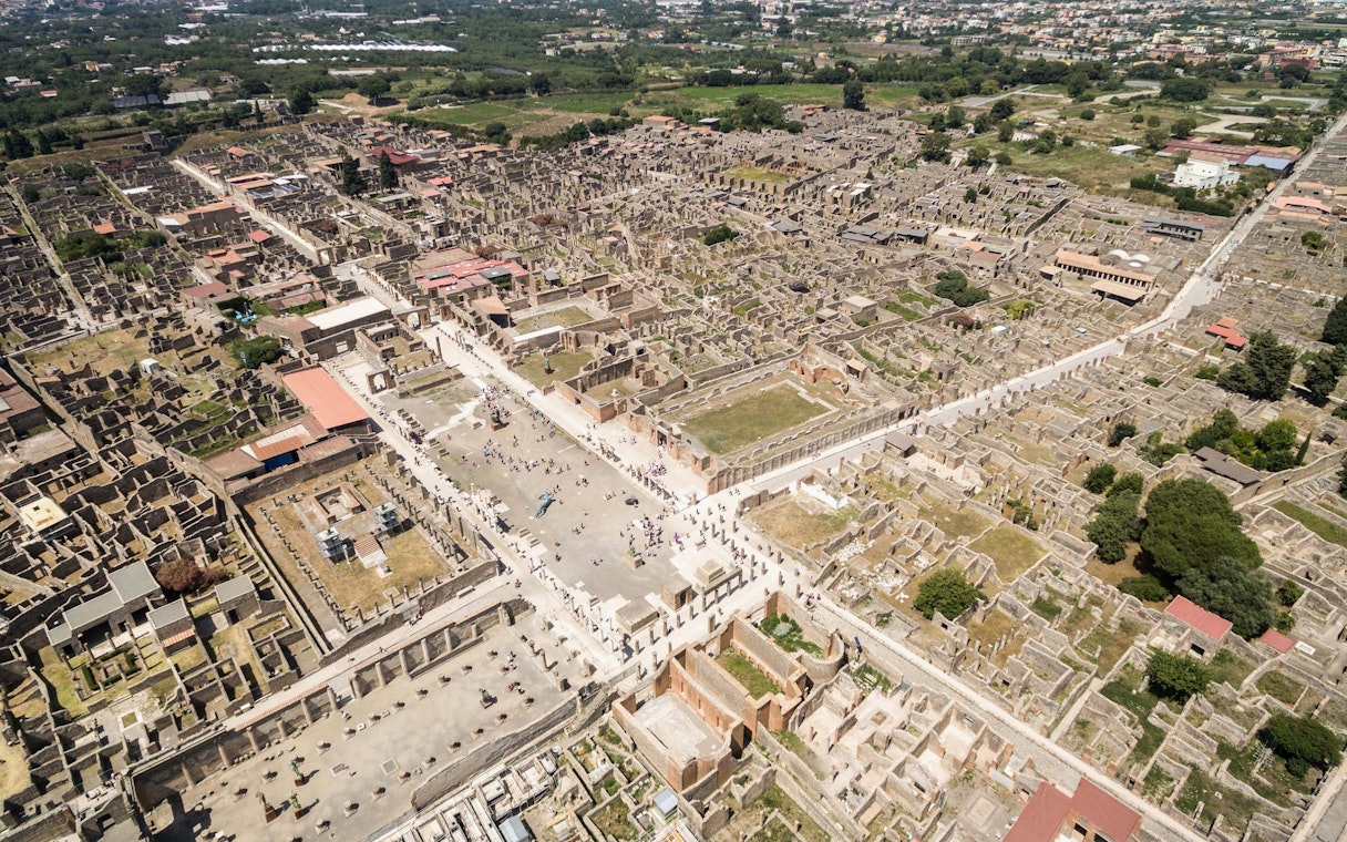 Aerial view of Herculaneum ruins in Italy, showcasing ancient streets and structures.